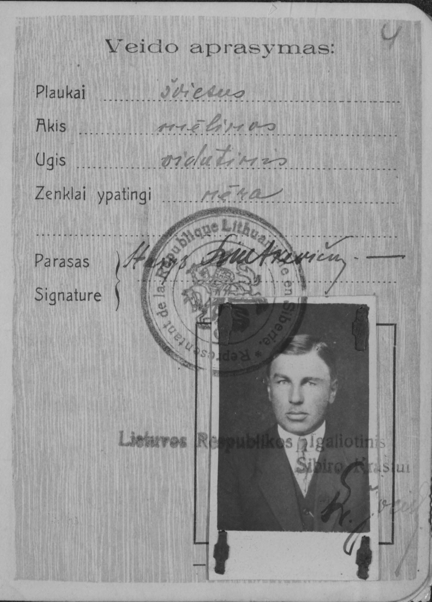 Iš Stasiui Liutkevičiui Lietuvos Respublikos įgaliotinio Sibiro kraštui išduoto Užsienio paso. 1922 m. Kauno regioninis valstybės archyvas. F. 66, ap. 2, b. 37275, l. 4.